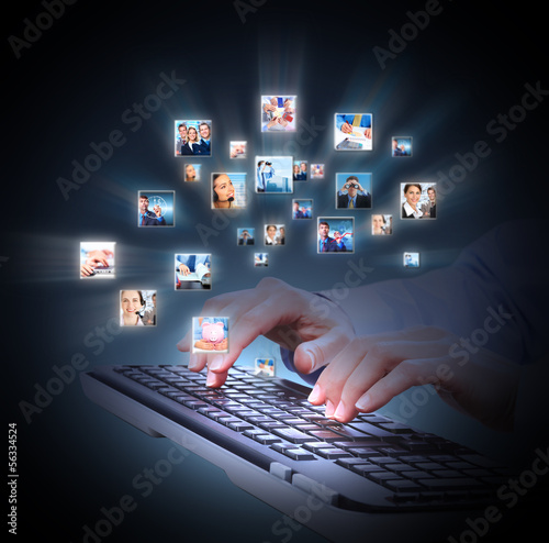 Photo: Hands with laptop computer keyboard. Hands with laptop computer keyboard.