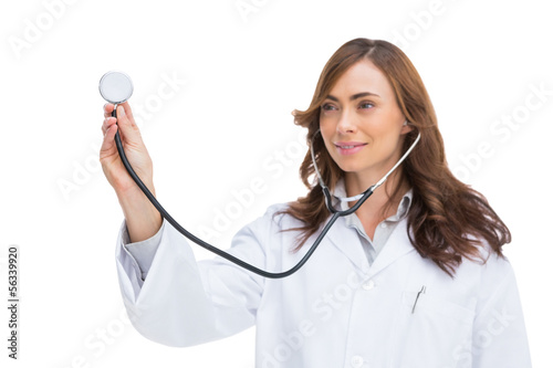 Photo: Smiling doctor holding stethoscope Smiling doctor holding stethoscope