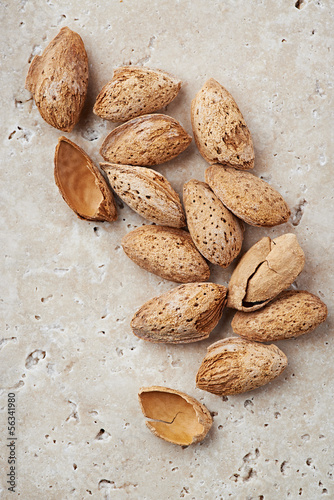 Photo: Almonds on a stone background Almonds on a stone background