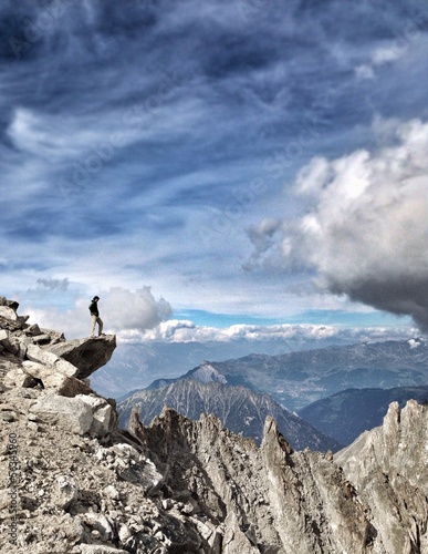 Instant Collection: Man on edge of a mountain Man on edge of a mountain