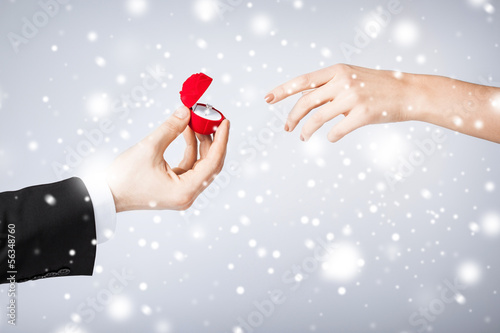 Photo: couple with wedding ring and gift box couple with wedding ring and gift box