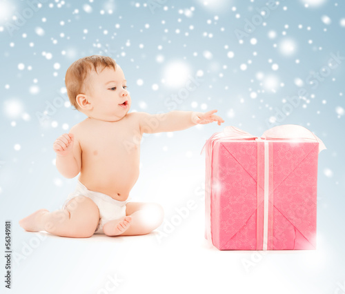 Photo: happy child with gift box happy child with gift box