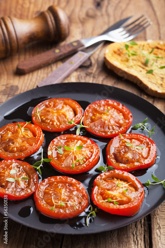 Photo: baked tomatoes with herbs and olive oil baked tomatoes with herbs and olive oil