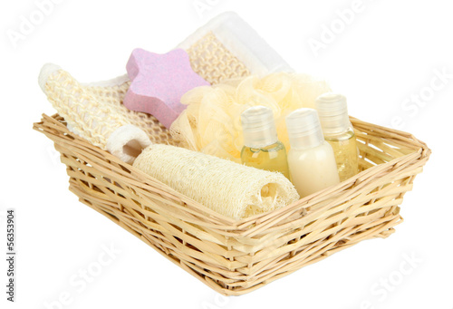 Photo: Set for spa in wicker basket, isolated on white Set for spa in wicker basket, isolated on white