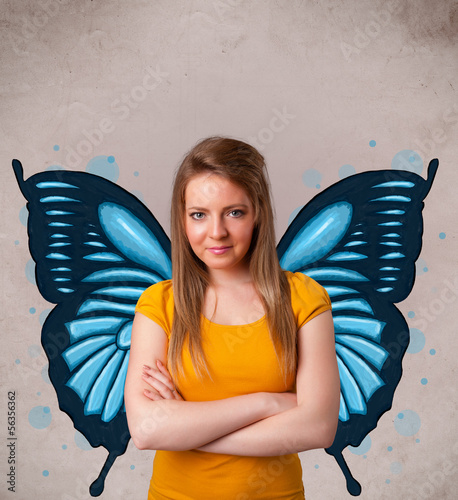 Photo: Young girl with butterfly blue illustration on the back Young girl with butterfly blue illustration on the back