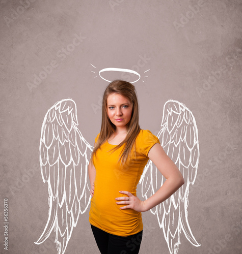 Photo: Cute girl with angel illustrated wings Cute girl with angel illustrated wings