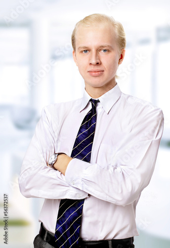 Photo: Beautiful business man in the office Beautiful business man in the office