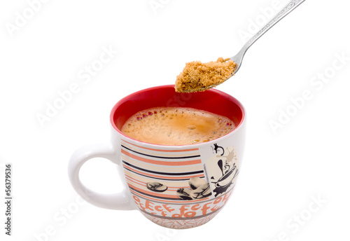 Photo: fill brown sugar to a cup of espresso coffee fill brown sugar to a cup of espresso coffee
