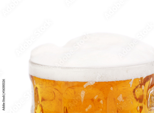 Photo: Mug of beer isolated on a white Mug of beer isolated on a white