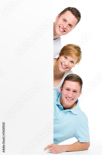 Photo: 3 junge leute mit werbetafel 3 junge leute mit werbetafel