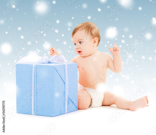 Photo: happy child with gift box happy child with gift box