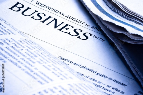 Photo: business word on newspaper business word on newspaper