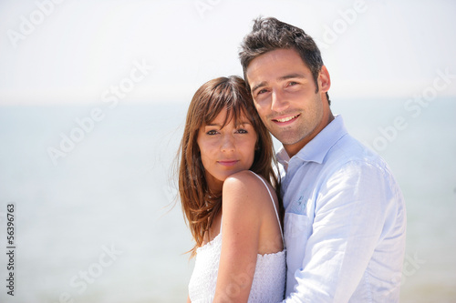 Photo: Couple hugging at the sea Couple hugging at the sea