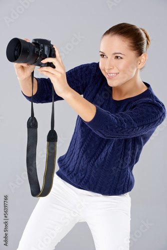 Photo: Pretty vivacious young female phoptographer Pretty vivacious young female phoptographer