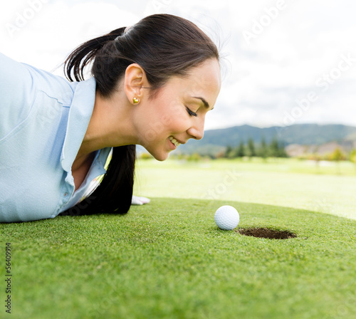 Photo: Golf player blowing ball Golf player blowing ball