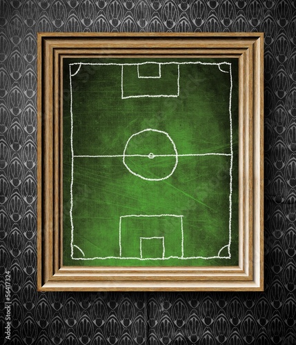 Illustration: Soccer field symbol chalkboard in old wooden frame Soccer field symbol chalkboard in old wooden frame