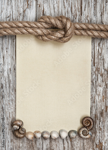 Photo: Ship rope, canvas, sea shells and old wood Ship rope, canvas, sea shells and old wood
