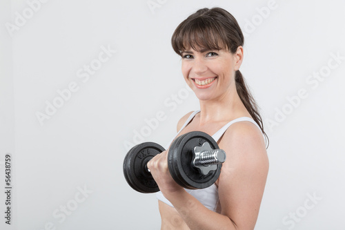 Photo: Frau mit Hantel Frau mit Hantel