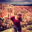 woman dancing in bryce canyon woman dancing in bryce canyon