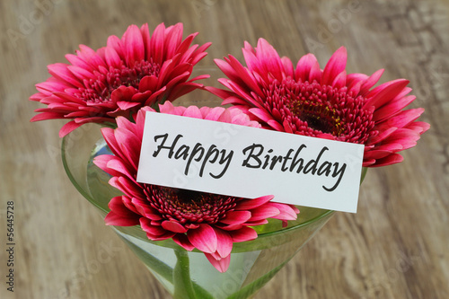 Photo: Happy Birthday card with pink gerbera daisies in martini glass Happy Birthday card with pink gerbera daisies in martini glass
