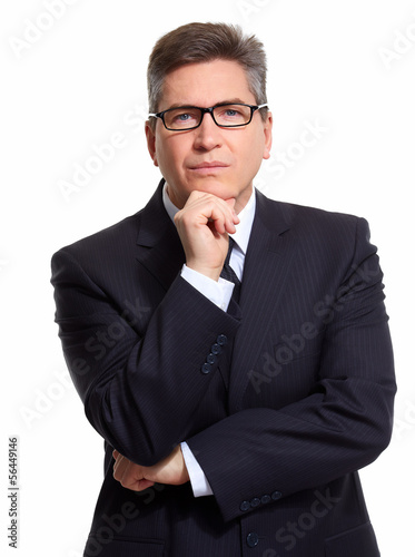 Photo: Businessman isolated on white. Businessman isolated on white.