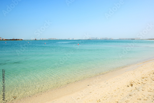 Photo: Beach of the luxury hotel with a view on Palm Jumeirah man-made Beach of the luxury hotel with a view on Palm Jumeirah man-made