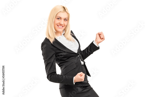 Photo: Young businesswoman gesturing happiness Young businesswoman gesturing happiness