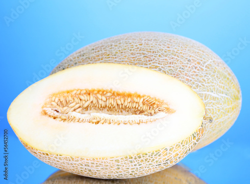 Photo: Ripe melons on blue background Ripe melons on blue background