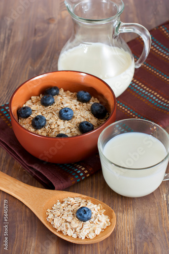 Photo: Healthy breakfast with bowl of oat flakes Healthy breakfast with bowl of oat flakes