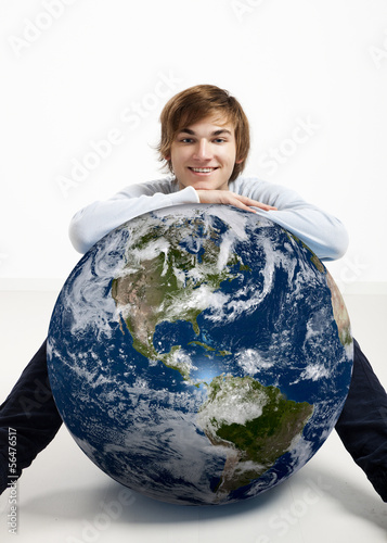 Photo: Young man over the earth Young man over the earth