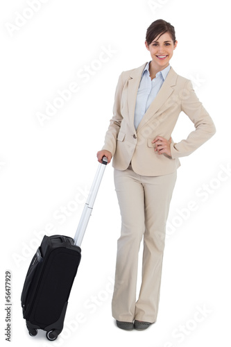 Photo: Happy businesswoman with suitcase Happy businesswoman with suitcase