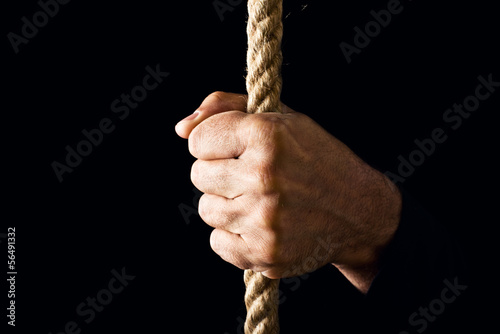 Photo: Holding a rope Holding a rope