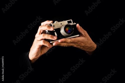 Photo: Man Holding Vintage Camera Man Holding Vintage Camera