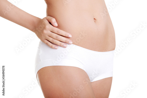 Photo: Sexy young woman in white panties Sexy young woman in white panties
