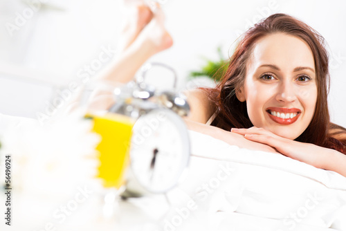 Photo: portrait of a young woman in the bedroom portrait of a young woman in the bedroom