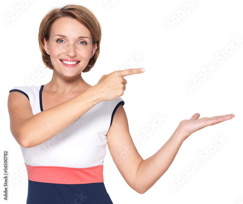 Photo: Happy woman with presentation gesture Happy woman with presentation gesture