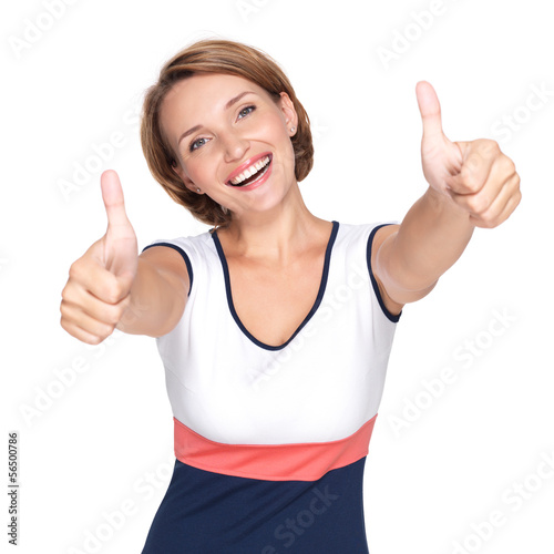 Photo: Portrait of a beautiful adult happy woman with thumbs up sign Portrait of a beautiful adult happy woman with thumbs up sign