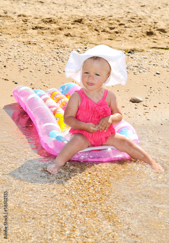 Photo: funny baby on the beach funny baby on the beach