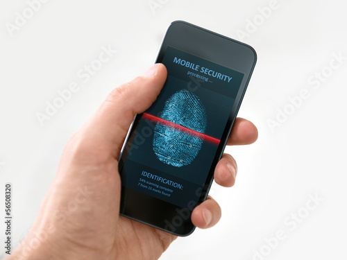 Photo: Hand holding smartphone with mobile security application Hand holding smartphone with mobile security application