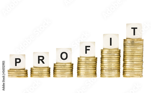 Photo: Word PROFIT on Row of Gold Coin Stacks Isolated White Word PROFIT on Row of Gold Coin Stacks Isolated White