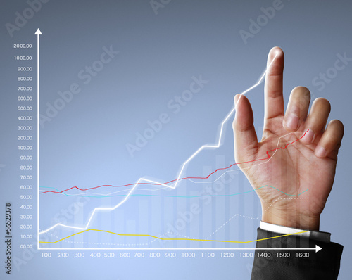 Photo: financial symbols coming from hand financial symbols coming from hand