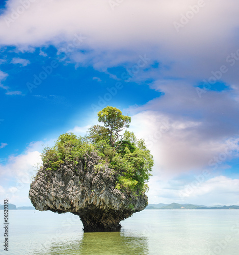 Photo: Beautiful sunset over isolated rock in Thailand Sea Beautiful sunset over isolated rock in Thailand Sea