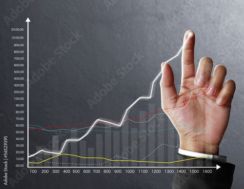 Photo: financial symbols coming from hand financial symbols coming from hand