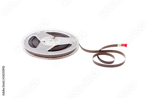 Photo: ancient reel audio tape isolated on white ancient reel audio tape isolated on white