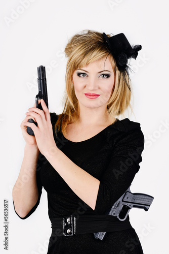 Photo: beautiful woman holding a gun beautiful woman holding a gun