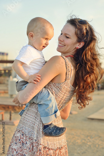 Photo: mother holding son mother holding son