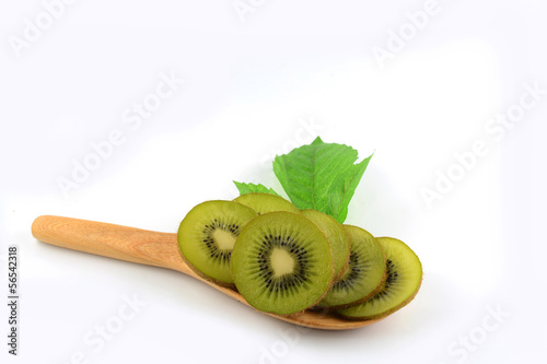 Photo: kiwi slice on white kiwi slice on white