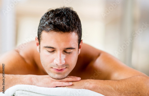 Photo: Man relaxing at the spa Man relaxing at the spa