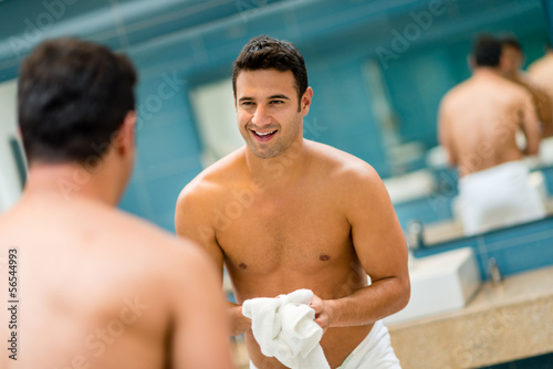 Photo: Man looking in the mirror Man looking in the mirror