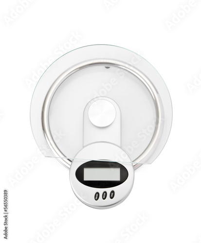Photo: Modern digital kitchen scale isolated on white background Modern digital kitchen scale isolated on white background